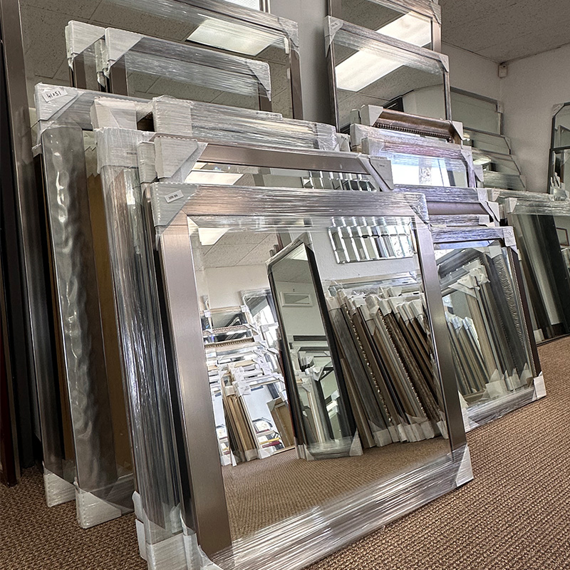 Baseball and cap in a deep shadow box